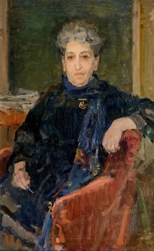 Geschilderd portret van Aletta Jacobs. Aletta Jacobs zit in een stoel met een arm over de rugleuning. Painted portrait of Aletta Jacobs. Aletta sits in a chair with her arm over the backrest.